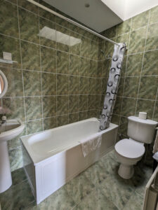 Ensuite bathroom with overhead shower, off the twin bedroom, Carnaclasha, no. 9, Rostrevor Holidays